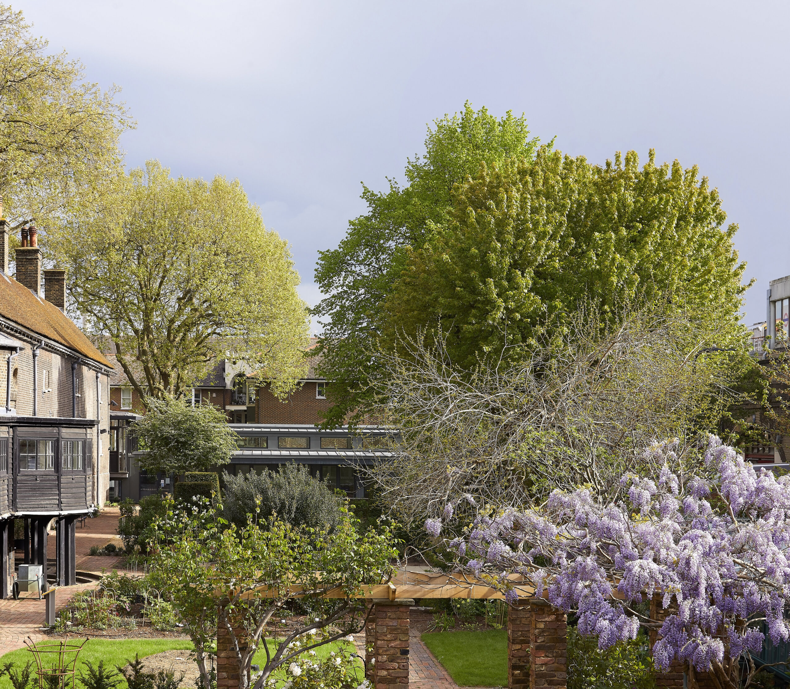 A view of gardens with trees.