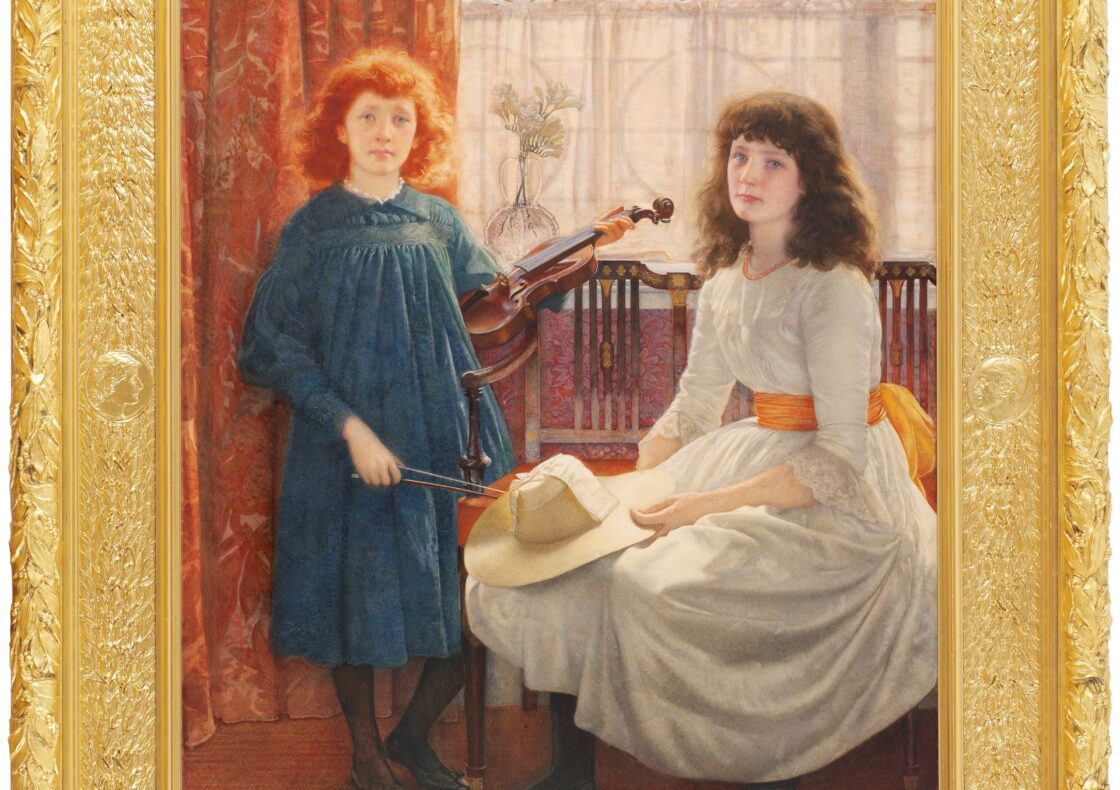 Elaborate gold frame painting of two sisters in a richly decorated interio:r a red-haired girl in a blue dress stands with a violin standing on the left, while dark-haired girl sits in a white gown with an orange sash holding a white straw hat on the right, before patterned curtains and a leaded-glass window and by orange-red curtains and a matching carpet.