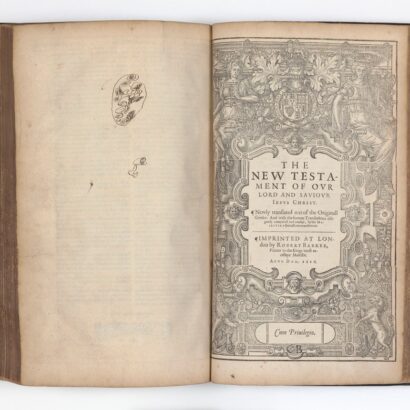 Bible from 1616, showing ornate New Testament title page with decorative border and royal coat of arms.
