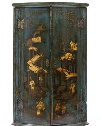 Blue-green corner cabinet with gold decorative scenes in imitation of East Asian lacquer.