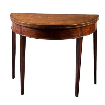 Mahogany table with tapered legs.