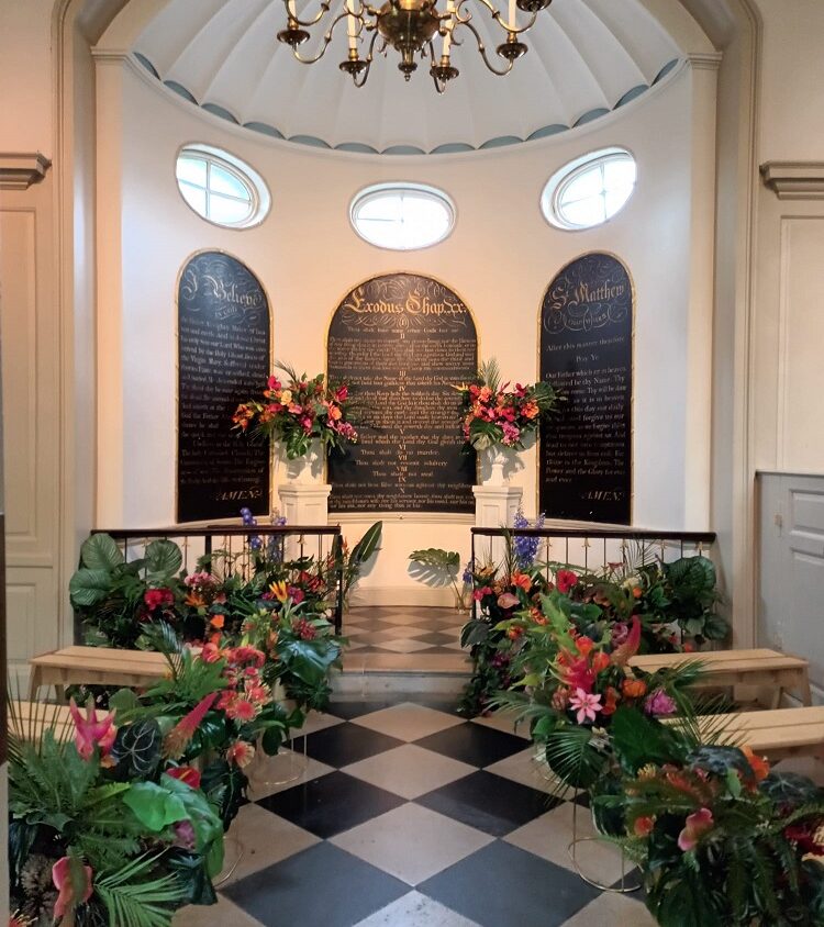 A chapel in the Museum of the Home lined with seats to create a wedding aisle