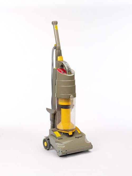 Dyson upright vacuum cleaner in yellow and gray with bagless canister design