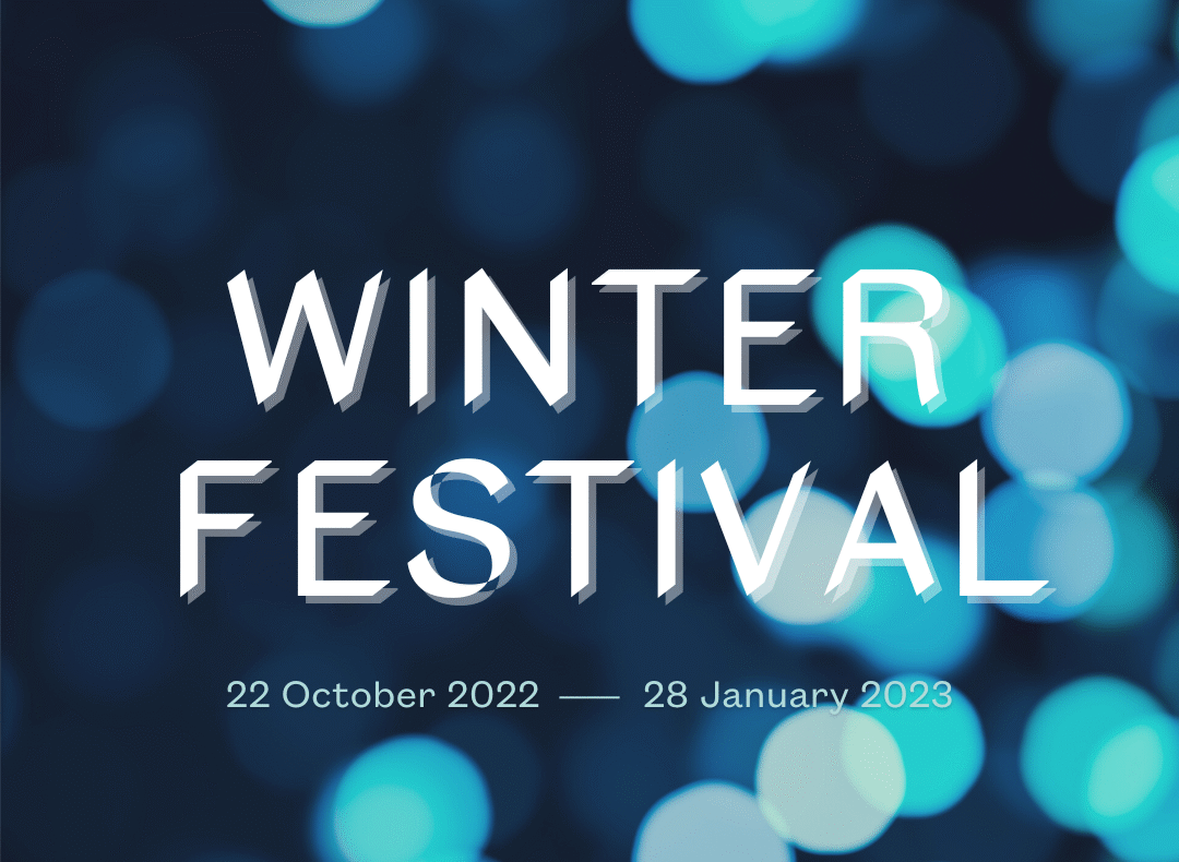 A promotional poster, set against a blurred background of teal and navy bokeh lights. Bold white letters read “Winter Festival,” with the dates “22 October 2022 — 28 January 2023” in smaller pale text beneath. The museum logo in white sits in the lower right corner.
