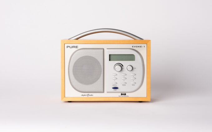 A 2000s PURE radio against a plan white backdrop