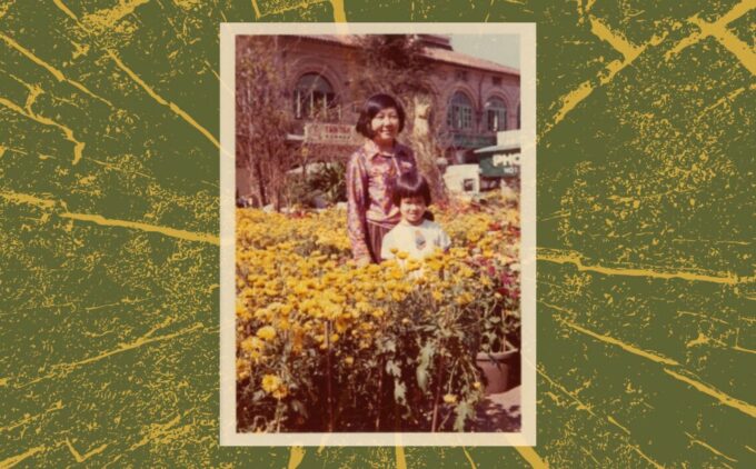 An old photograph of an woman and child standing among yellow flowers. The photo is surrounded by a yellow and green artistic tree-like pattern.