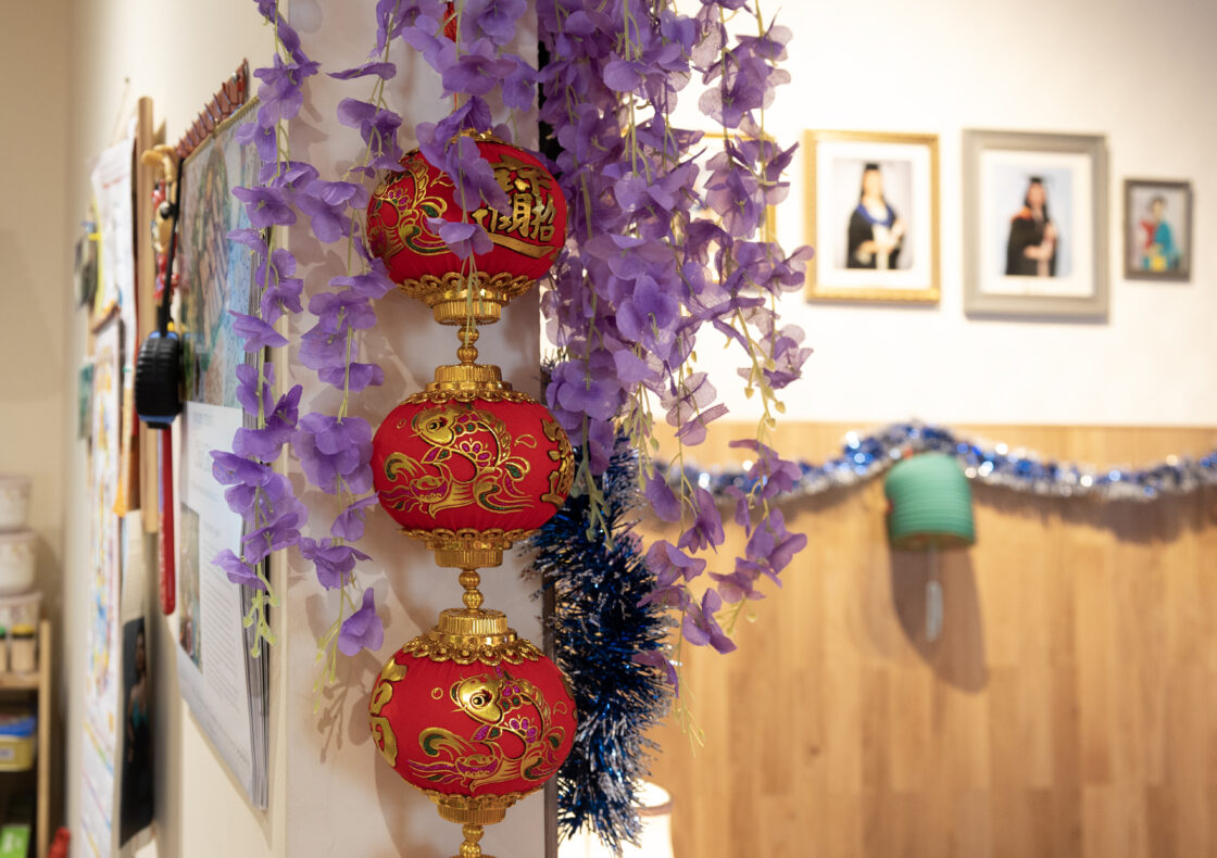 A celebration wall hanging displayed for Luner New Year, photographed in our Rooms Through Time.