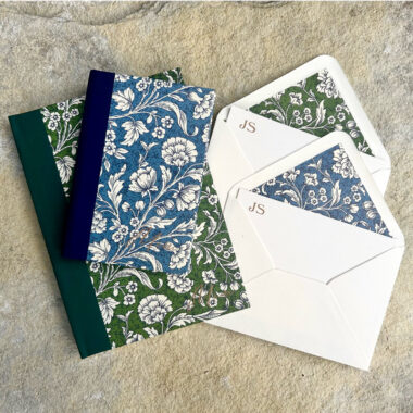Floral designs on notebooks and envelopes